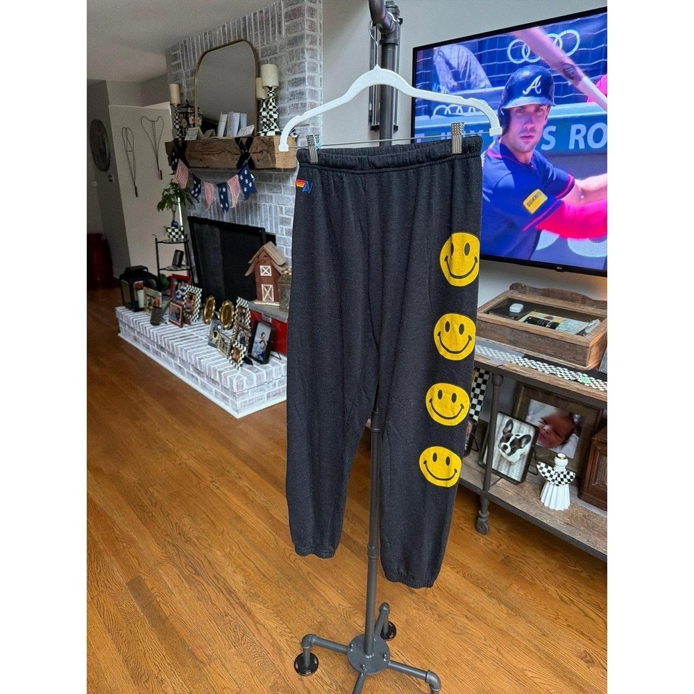 Aviator Nation Smiley Face sweatpants feature yellow smiley face graphics medium
